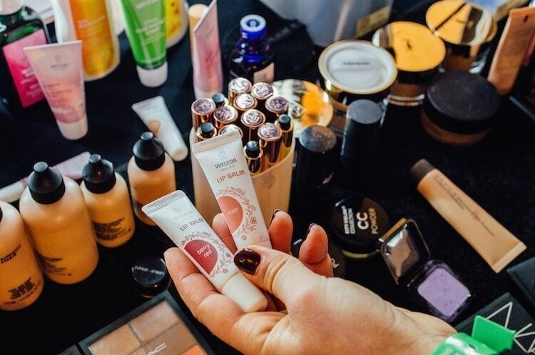 Weleda Tinted Lip Balms backstage at the Paula Knorr show