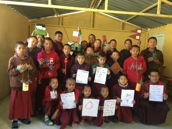 Monks and schoolchildren learn about reduce, reuse and recycle