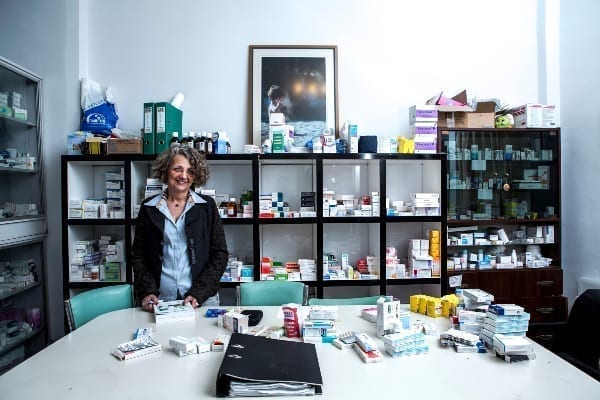 Dr Olga Kesidou with surplus medicines at the Solidarity Clinic of Peristeri, Athens