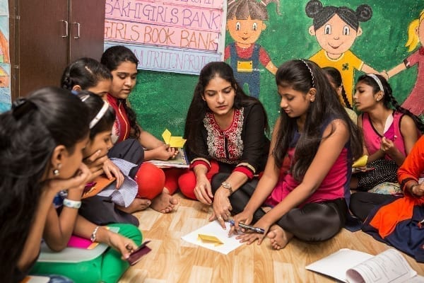 Aarti Naik with schoolgirls at Sakhi for Girls Education