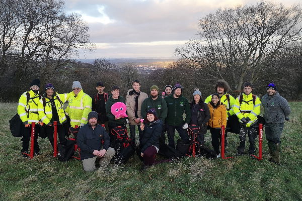 Octopus Energy team take a break from tree planting with Veterans for Mental Health
