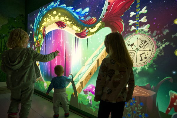 Children engage with the Satuseinä Storywall