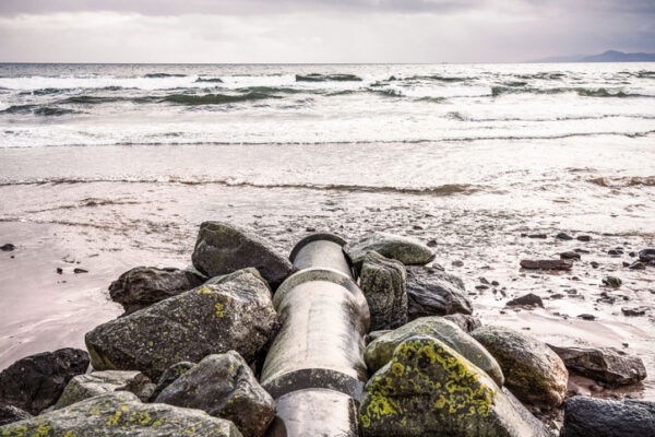 A large pipeline leading out to the sea