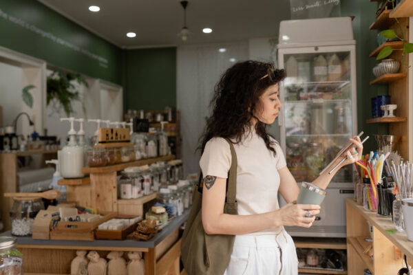 Young female shopping in an eco lifestyle store