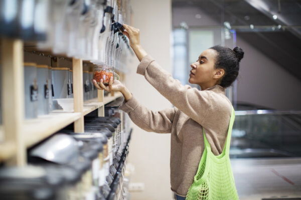 Woman buying food in zero waste shop