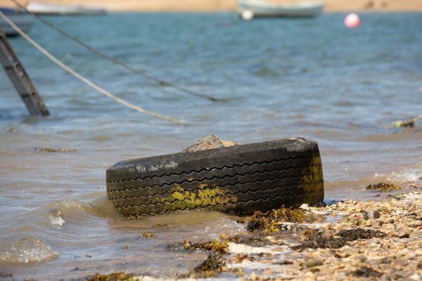 Tyre washed up on the shore