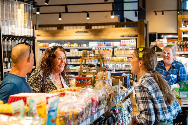 Customers and staff share a good joke at Flourish's 1st birthday party